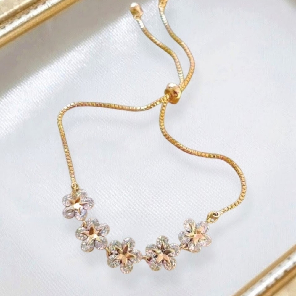 Elegant Gold Floral Bracelet With Stars